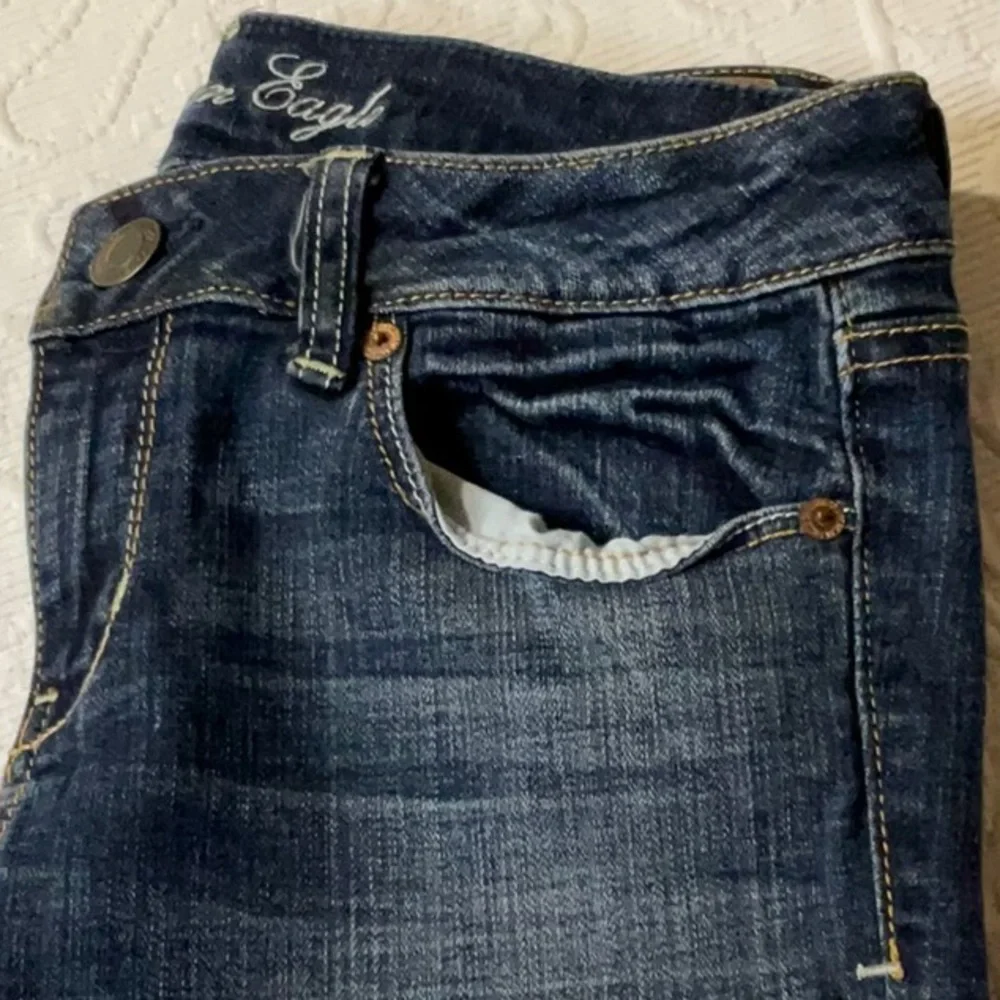 American Eagle Outfitters Women's Skinny Jeans - Dark Blue Wash Distressed.